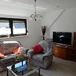 In Apartment *